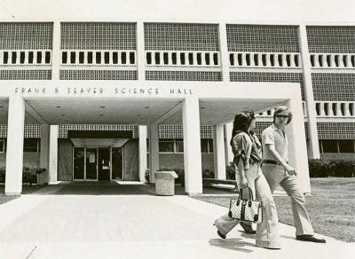 Entrance to Seaver Science Hall in 1979 with several students coming and going